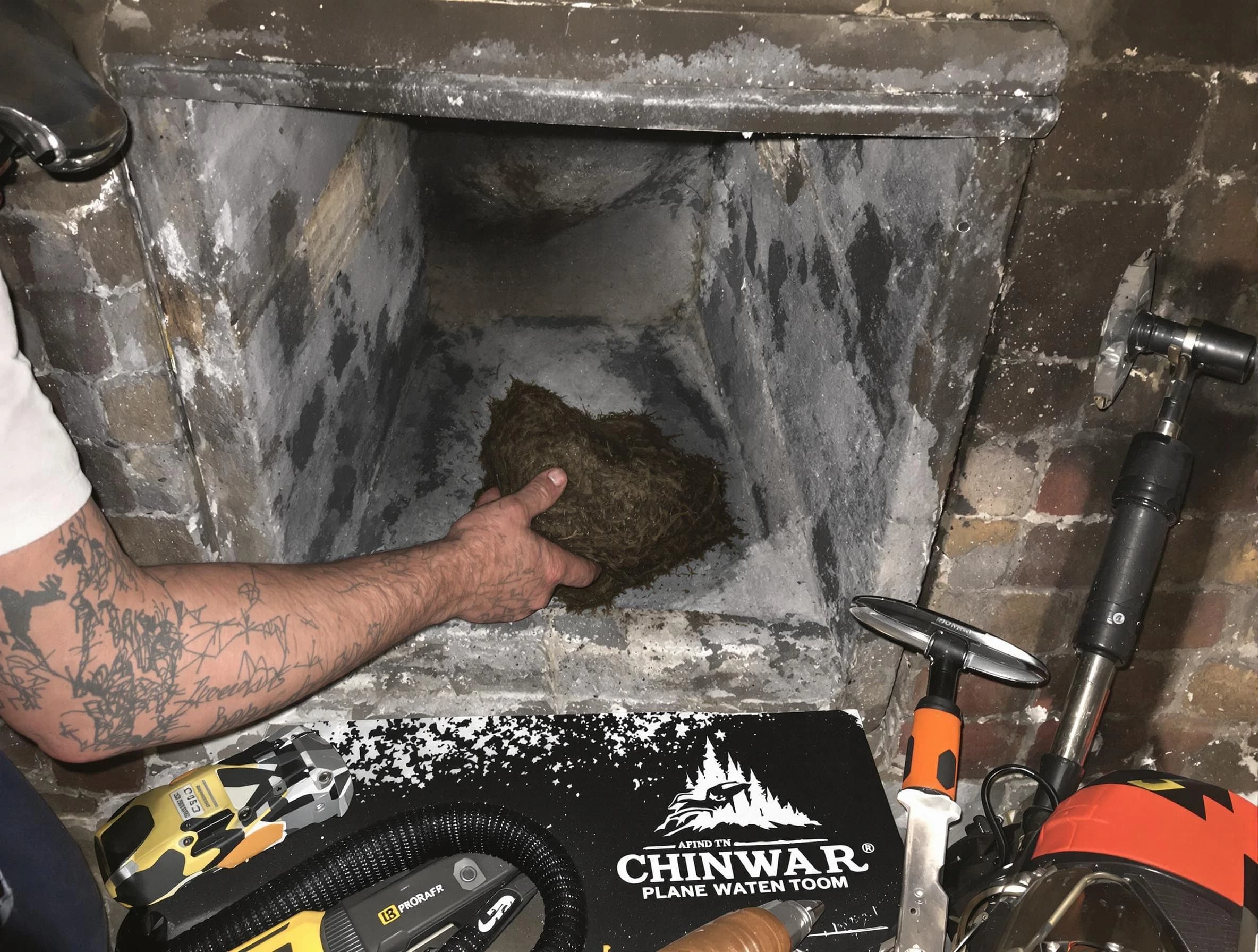 Trussville Chimney Sweep safely removing debris and screening chimney in Trussville, AL